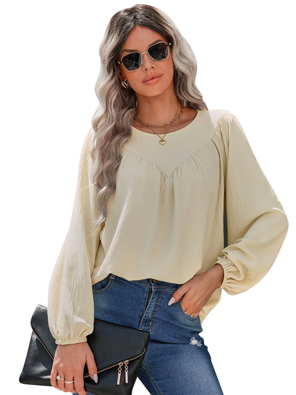 Camisa feminina casual solta com gola redonda e cor sólida