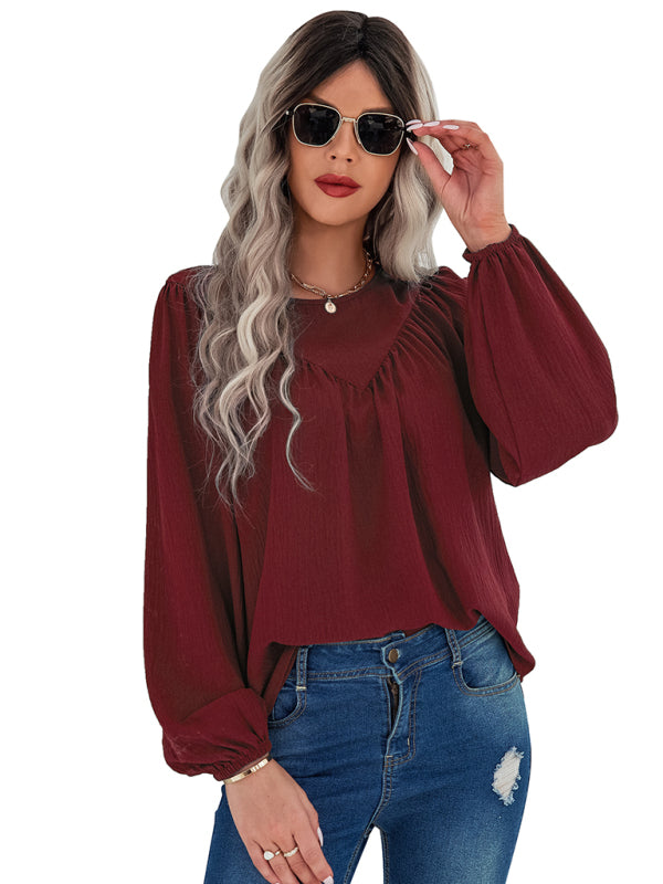 Camisa feminina casual solta com gola redonda e cor sólida