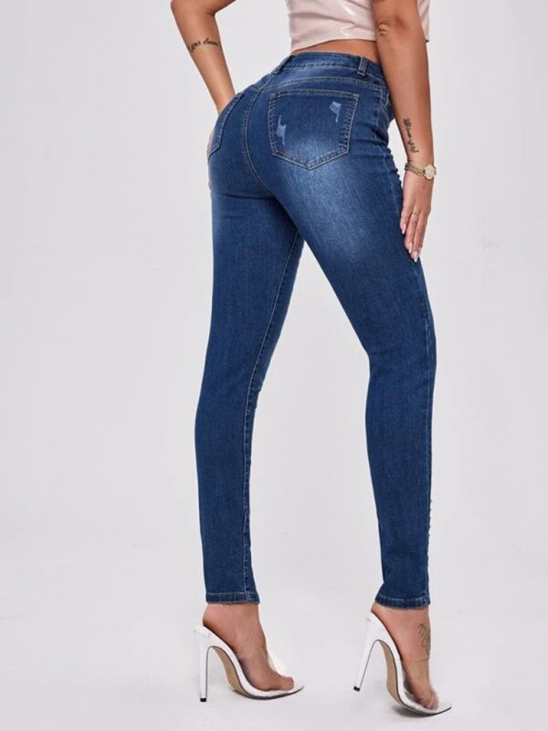 Calça jeans feminina slim com costura com fenda e cintura alta